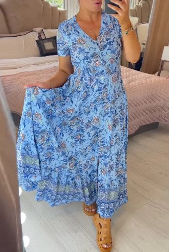 Dress with floral motif and V-neck